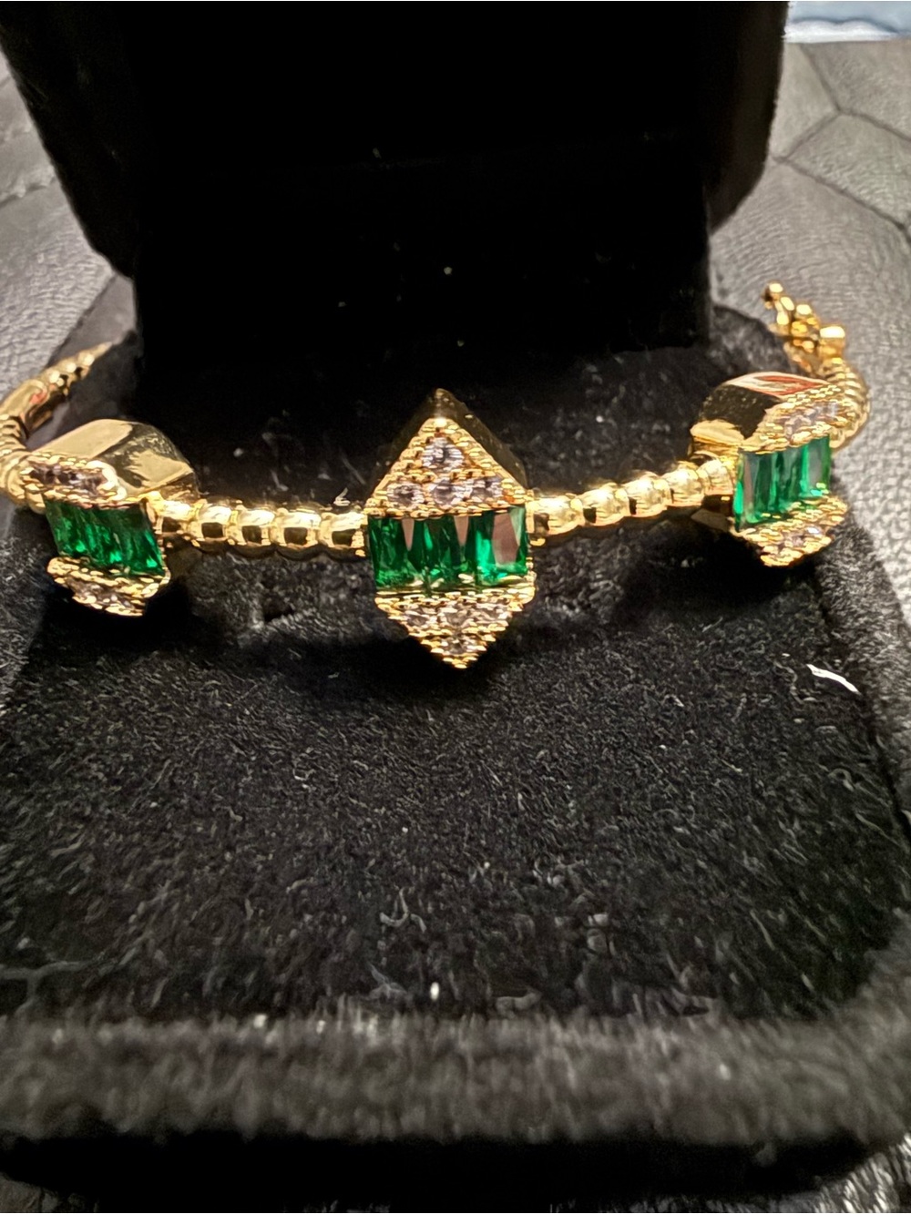 Adina Eden Gold Tone Bracelet with Emerald Green Stones and Clear Accents